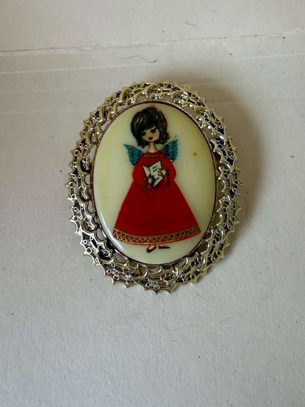 Vintage Gold Tone Holiday Caroling Angel In Red Dress Oval Pin Brooch.